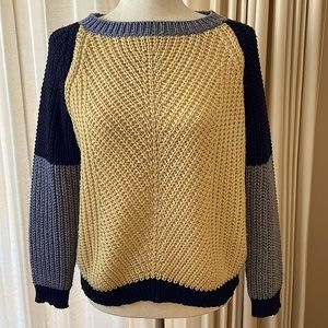 Delightful color block chunky knit sweater.